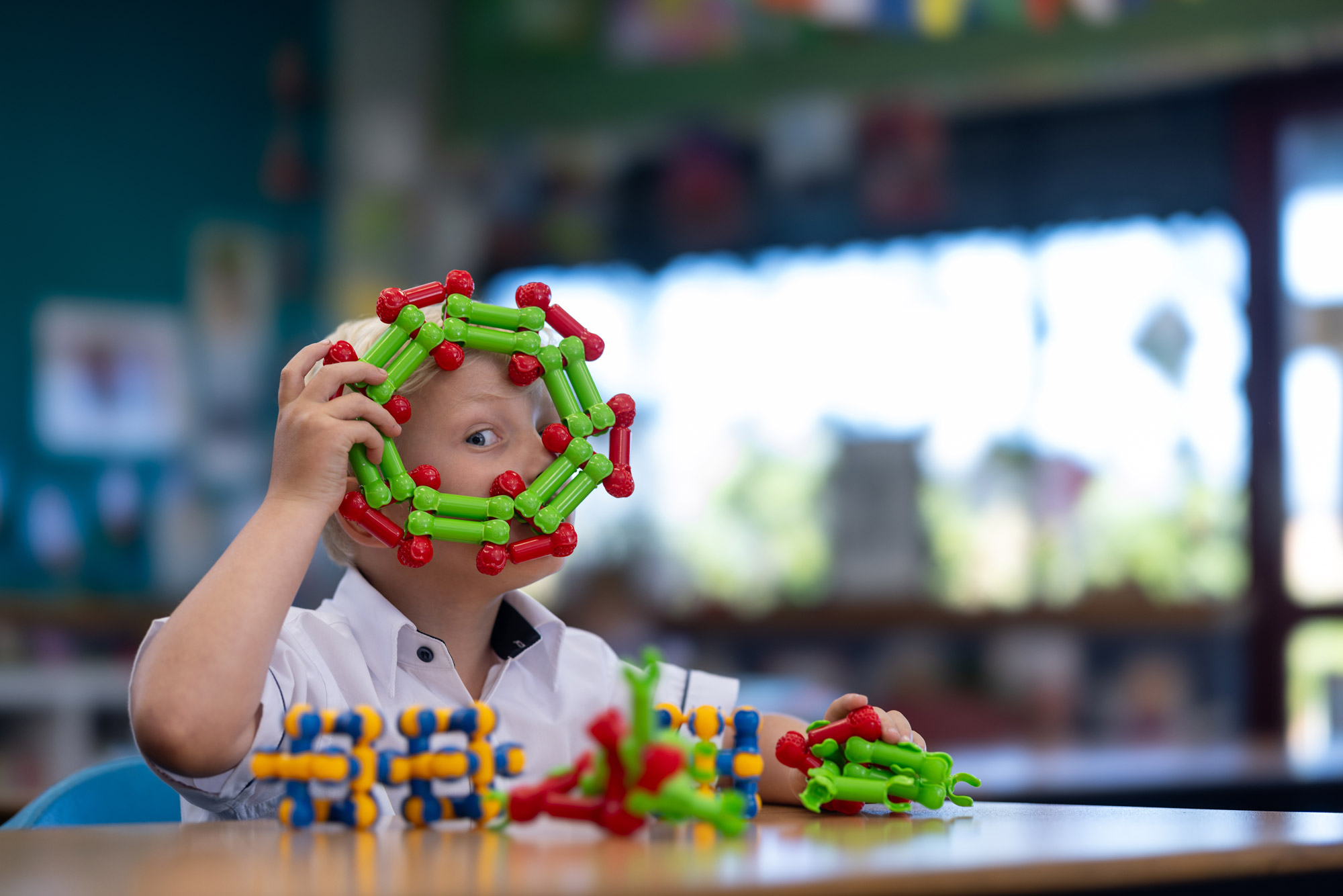 Student looking curious in hands on learning